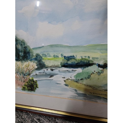 134 - 2x framed and glazed watercolours inc a Llangurig  river scene by P.E. Sylvester along with a framed... 