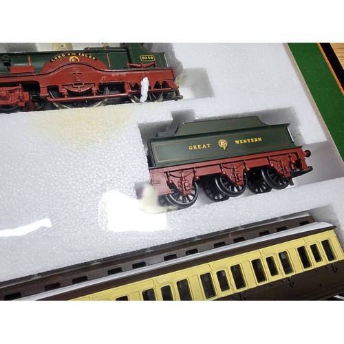 41 - A boxed Hornby R795 Lord of the Isles train pack, like new GWR 4-2-2 loco and tender 3 GWR clerestor... 