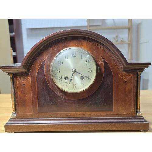 186 - A vintage oak mantel clock with an unusual pierced dial having an Enfield 8 day movement and complet... 