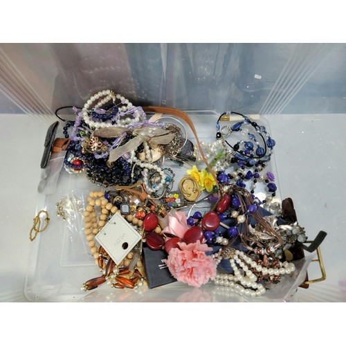 155 - Large tub of costume jewels inc. bracelets, watches, bangles.