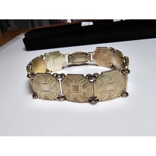 196 - A good early vintage 925 silver panel link bracelet from the 1940's, each panel has an ornate engrav... 