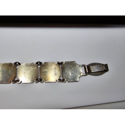 196 - A good early vintage 925 silver panel link bracelet from the 1940's, each panel has an ornate engrav... 