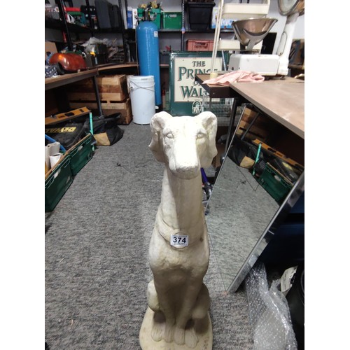 374 - Large tall concrete greyhound figure in good order sitting up stands at 80cm high, 26cm wide and 26c... 