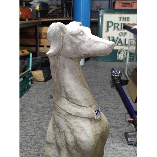 374 - Large tall concrete greyhound figure in good order sitting up stands at 80cm high, 26cm wide and 26c... 