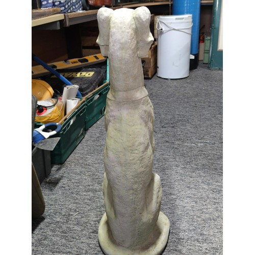 374 - Large tall concrete greyhound figure in good order sitting up stands at 80cm high, 26cm wide and 26c... 