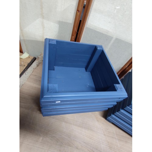 380 - 2x good quality well made wooden blue planters, standing on 4 legs, height 29cm, 34cm square