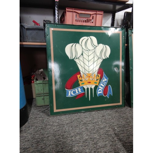 390 - A large metal double sided Prince of Wales pub sign in a wrought iron frame with hanging hooks to th... 