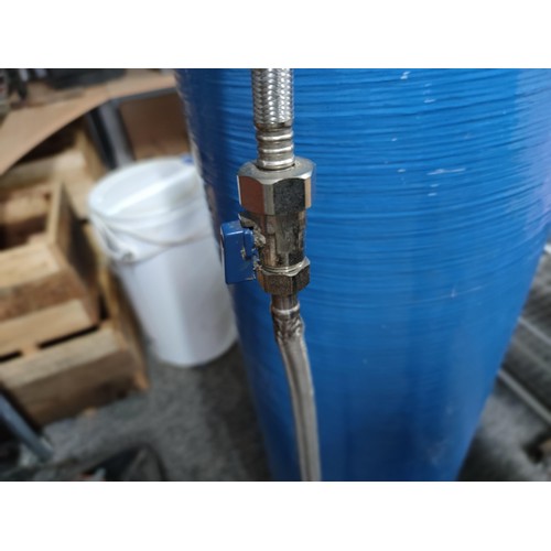 394 - A large tall blue coloured water filter with attachments to the top with a 12gpm attachment, by Pent... 