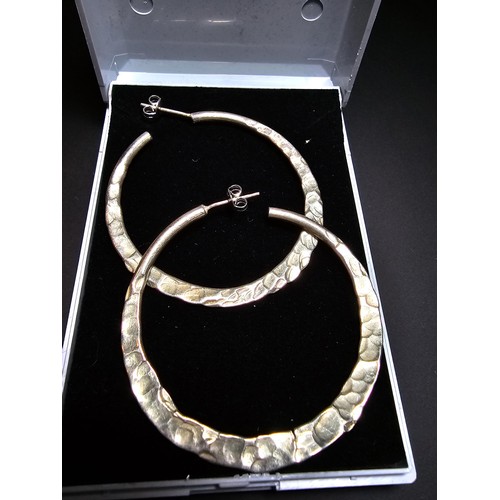 202 - A pair of large 925 silver hoop earrings, in good clean condition and boxed, diameter 4.5cm each.