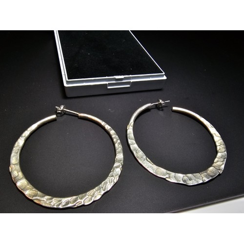 202 - A pair of large 925 silver hoop earrings, in good clean condition and boxed, diameter 4.5cm each.