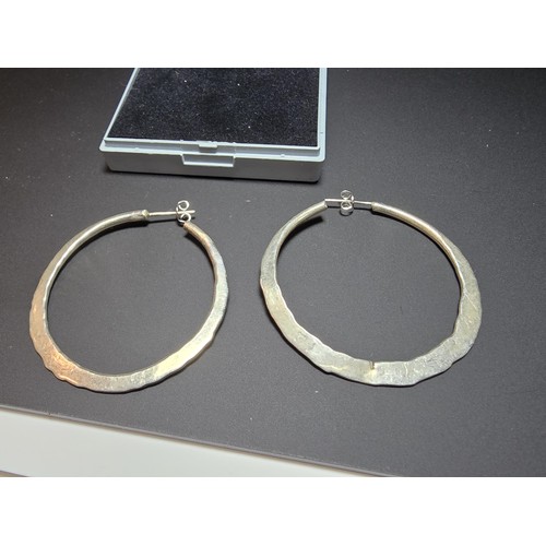 202 - A pair of large 925 silver hoop earrings, in good clean condition and boxed, diameter 4.5cm each.