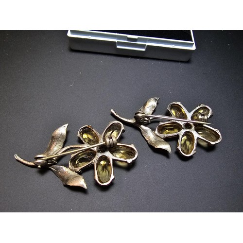 203 - 2x matching 925 silver flower brooches of good quality, both inset with faceted genuine citrine gems... 