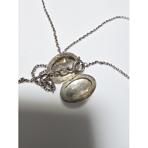 216 - A 925 silver locket on an 18