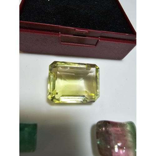 226 - A collection of 3 gemstones to include a large faceted natural citrine gemstone rectangular cut, a f... 