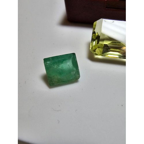 226 - A collection of 3 gemstones to include a large faceted natural citrine gemstone rectangular cut, a f... 