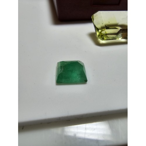 226 - A collection of 3 gemstones to include a large faceted natural citrine gemstone rectangular cut, a f... 