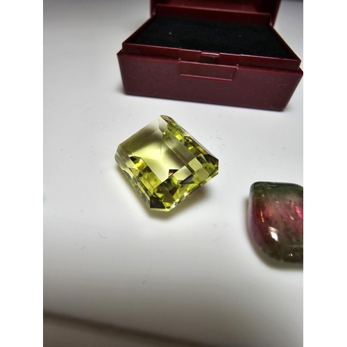 226 - A collection of 3 gemstones to include a large faceted natural citrine gemstone rectangular cut, a f... 