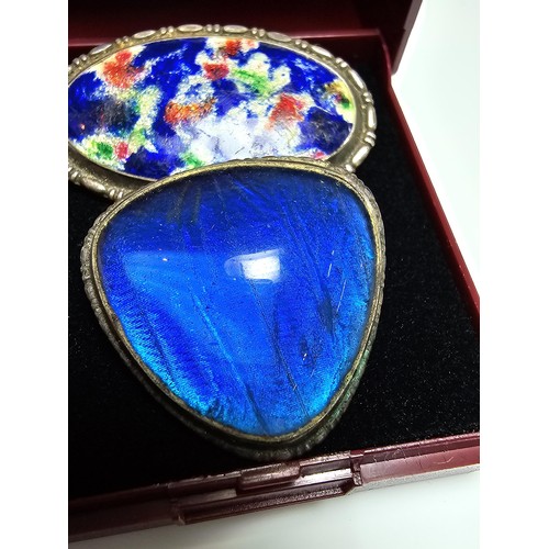 227 - 2x 925 silver vintage brooches, 1 with a blue glass design, the other with an enamelled design, both... 