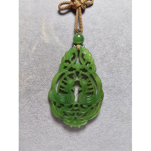 230A - A vintage impressive large carved genuine jade pendant with a cockerel scene, displays well on a lon... 