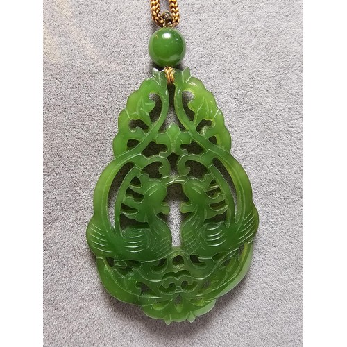 230A - A vintage impressive large carved genuine jade pendant with a cockerel scene, displays well on a lon... 