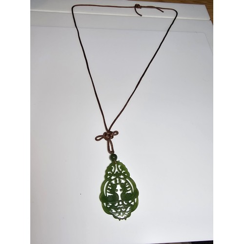 230A - A vintage impressive large carved genuine jade pendant with a cockerel scene, displays well on a lon... 