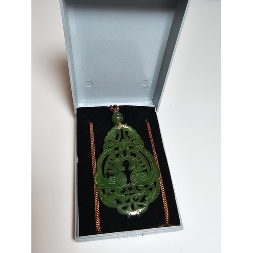 230A - A vintage impressive large carved genuine jade pendant with a cockerel scene, displays well on a lon... 