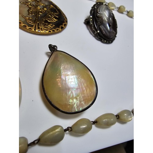 232 - A collection of good quality mother of pearl jewellery to include 3 good mother of pearl pendants wi... 