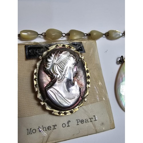 232 - A collection of good quality mother of pearl jewellery to include 3 good mother of pearl pendants wi... 