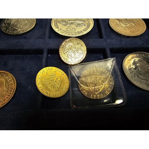 233 - The historic coins of Great Britain case containing a quantity of coins to include a £5 coin along w... 