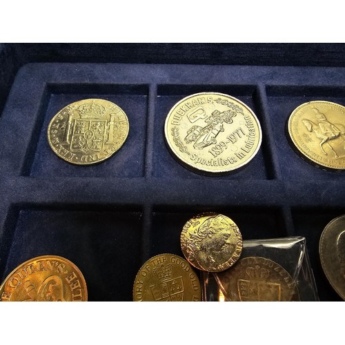 233 - The historic coins of Great Britain case containing a quantity of coins to include a £5 coin along w... 