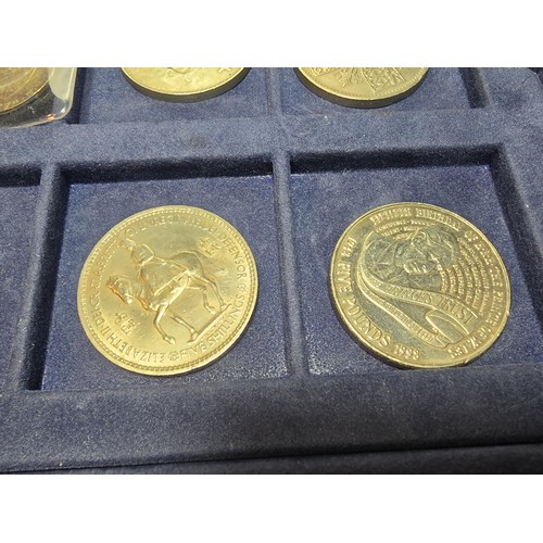 233 - The historic coins of Great Britain case containing a quantity of coins to include a £5 coin along w... 