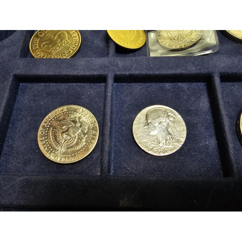 233 - The historic coins of Great Britain case containing a quantity of coins to include a £5 coin along w... 