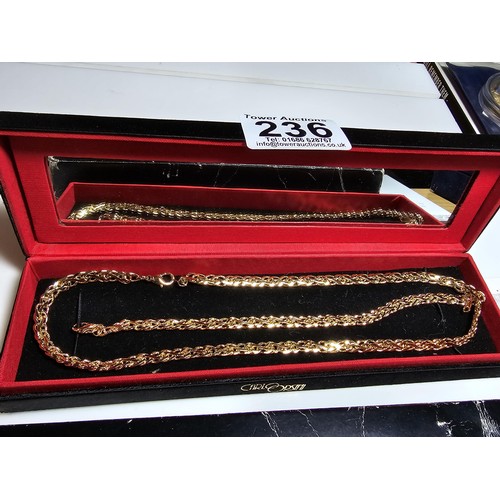 236 - A Carlo Orsini gold plated necklace and bracelet set in as new unused condition and complete with it... 