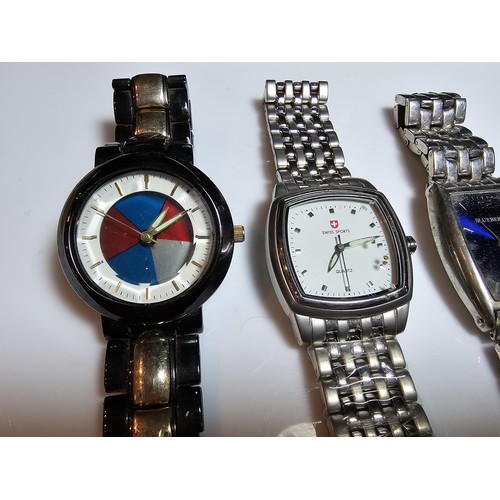 238 - A collection of 6x various wristwatches along with a cased wristwatch by Montre Suisse.