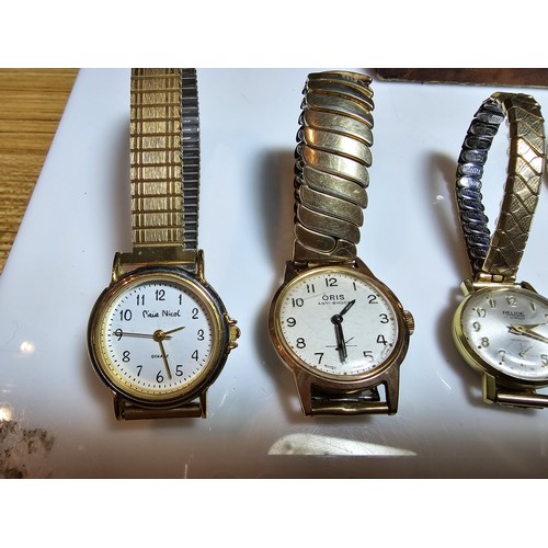 242 - A collection of 9 various vintage wrist watches including Oris, Rotary, Relide, along with a vintage... 