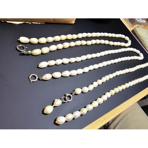 243 - A large collection of pearl jewellery to include a good genuine pearl necklace with a 925 silver cla... 