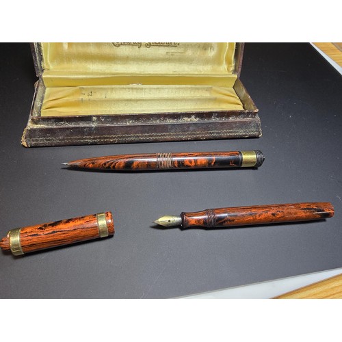 244 - A vintage good quality cased pen set by Conway Stewart to include a Dinky no.526M fountain pen and a... 