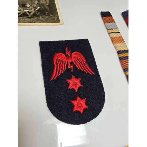 253 - A small quantity of military items to include 2 embroidered patches to include a Lifeguards patch an... 