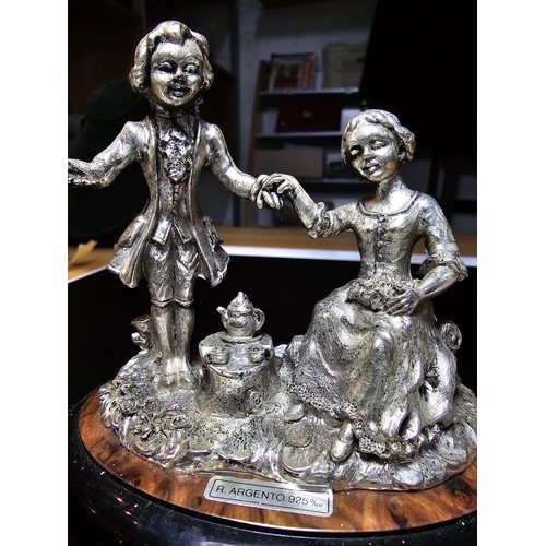 254 - An Italian silver plated figure group of a gentleman and a lady having tea by Ciro Senatore in good ... 