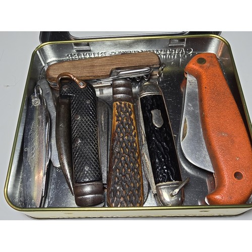 256 - A tin full of 7 good vintage penknives to include a military WWII jackknife dated 1939, a C.Johnson,... 