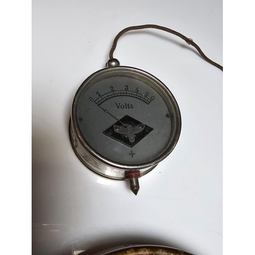 257 - A collection of 3 vintage compasses along with a bolt meter gauge to include a military compass, a l... 