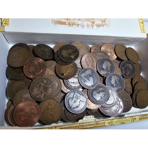 260 - A cigar box containing a large quantity of antique and vintage British copper pennies.