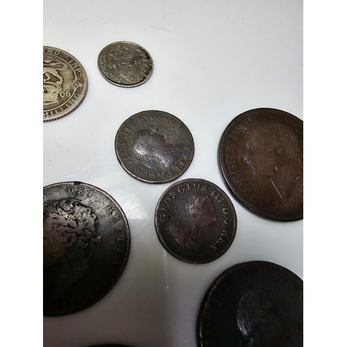 261 - A wooden box containing a large quantity of various vintage and antique British coins which includes... 