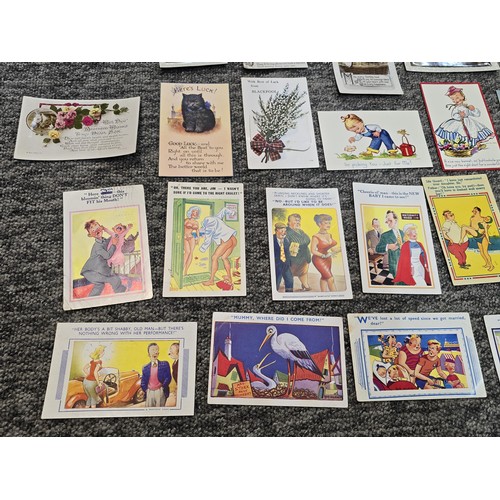 264 - A collection of vintage comical postcards and greeting cards along with a small quantity of ephemera... 