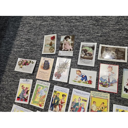 264 - A collection of vintage comical postcards and greeting cards along with a small quantity of ephemera... 