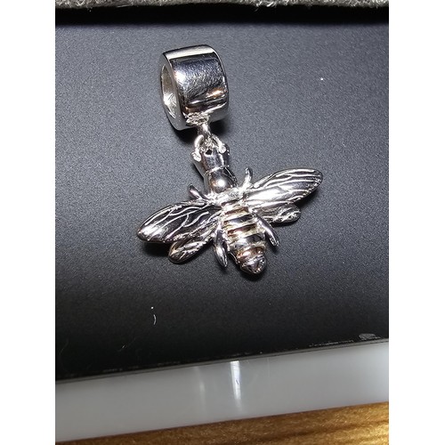 270 - A genuine Clogau women's 925 silver and 9ct rose Welsh gold queen Bee dangle milestone bead charm. C... 