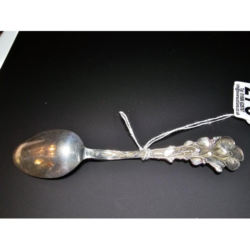 273 - A solid sterling silver collectable spoon marked to the spoon 