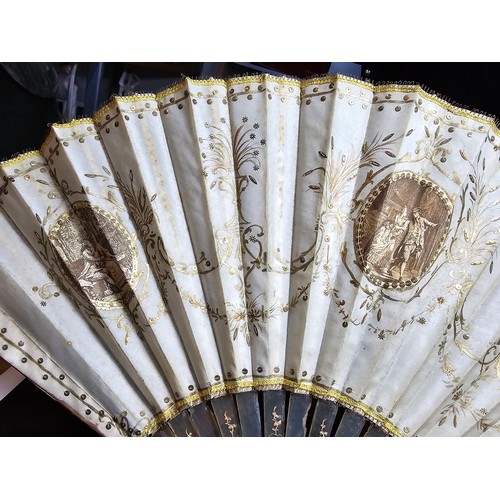 278 - A good antique folding fan in good looked after condition along with a hallmarked silver handle shoe... 