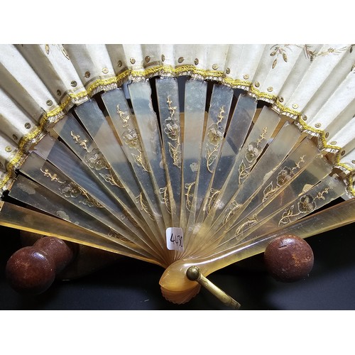 278 - A good antique folding fan in good looked after condition along with a hallmarked silver handle shoe... 