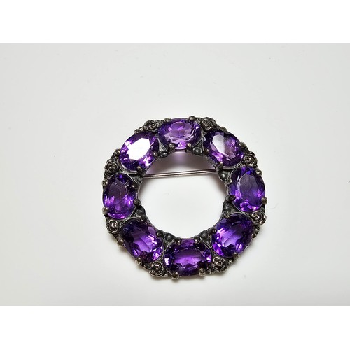 285 - A fine quality 925 silver vintage brooch inset with 8x faceted amethyst gemstones, each stone is of ... 